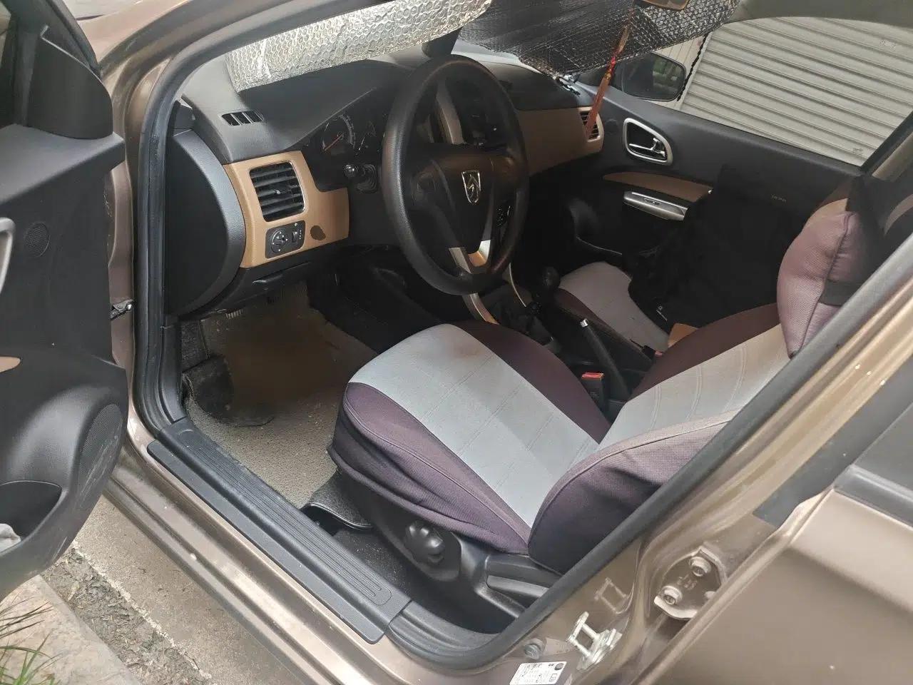 Baojun 630 2013 1.5L manual Comfort trim — миниатюра 16