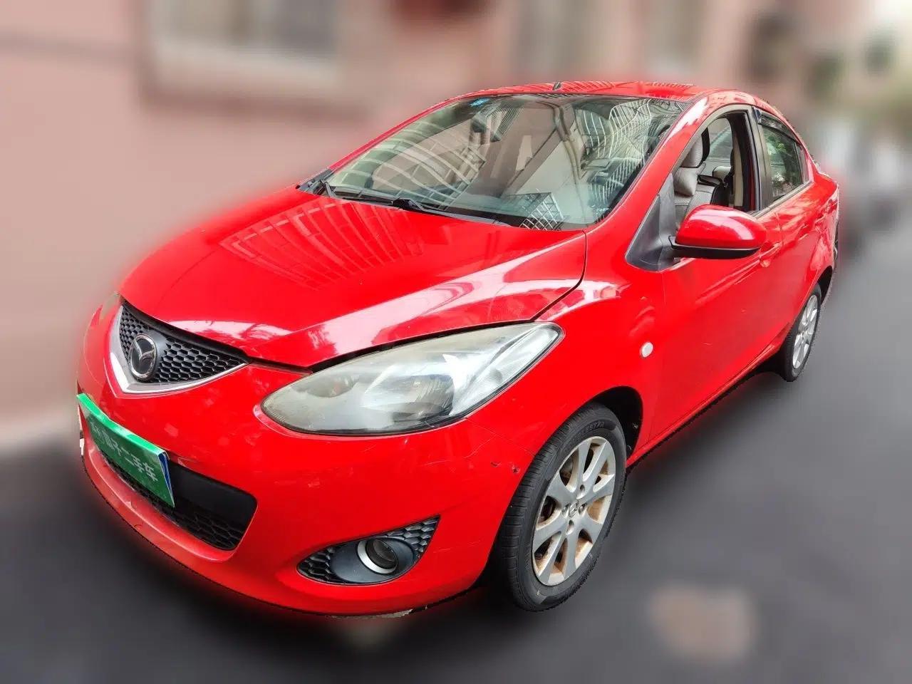 Mazda 2 2011 XuanDong 1.5L Manual Fashion Edition — миниатюра 1