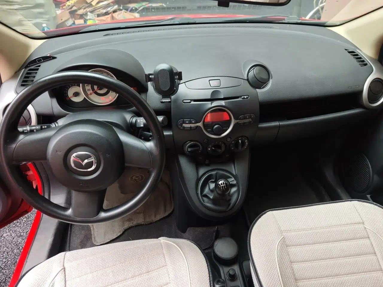 Mazda 2 2011 XuanDong 1.5L Manual Fashion Edition — миниатюра 9