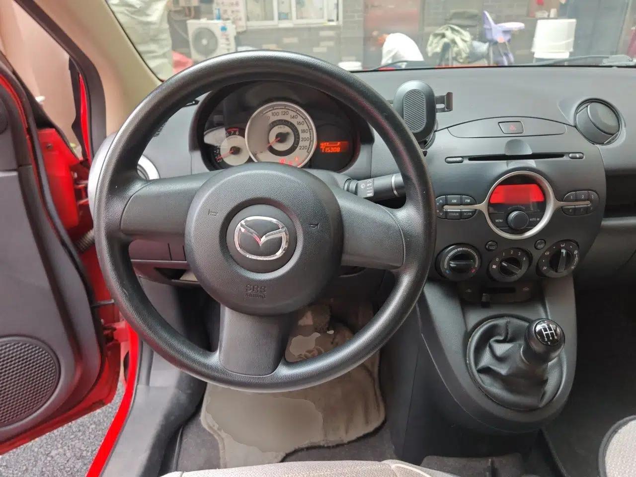 Mazda 2 2011 XuanDong 1.5L Manual Fashion Edition — миниатюра 10