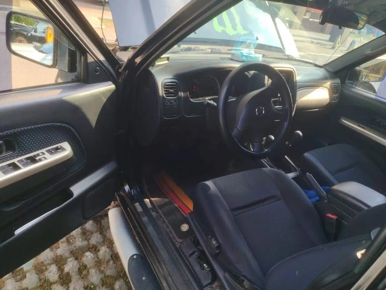 Nissan Paladin 2013 2.4L Four-Wheel Drive Standard Version China IV Standard — миниатюра 16