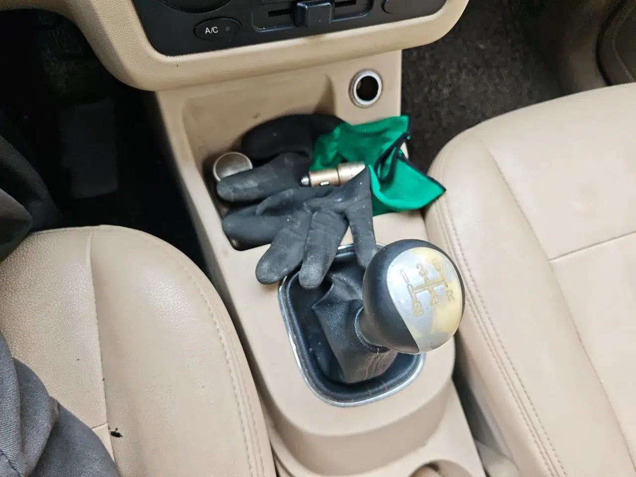 Dongfeng Fengon 370 2016 1.5L Manual Standard Edition SFG15-05 7 Seats — миниатюра 14