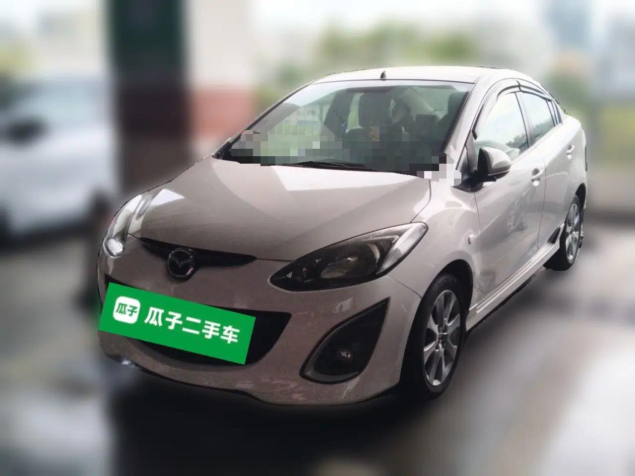 Mazda 2 2012 Sedan XuanDong 1.5L Automatic Fashion Edition — миниатюра 1