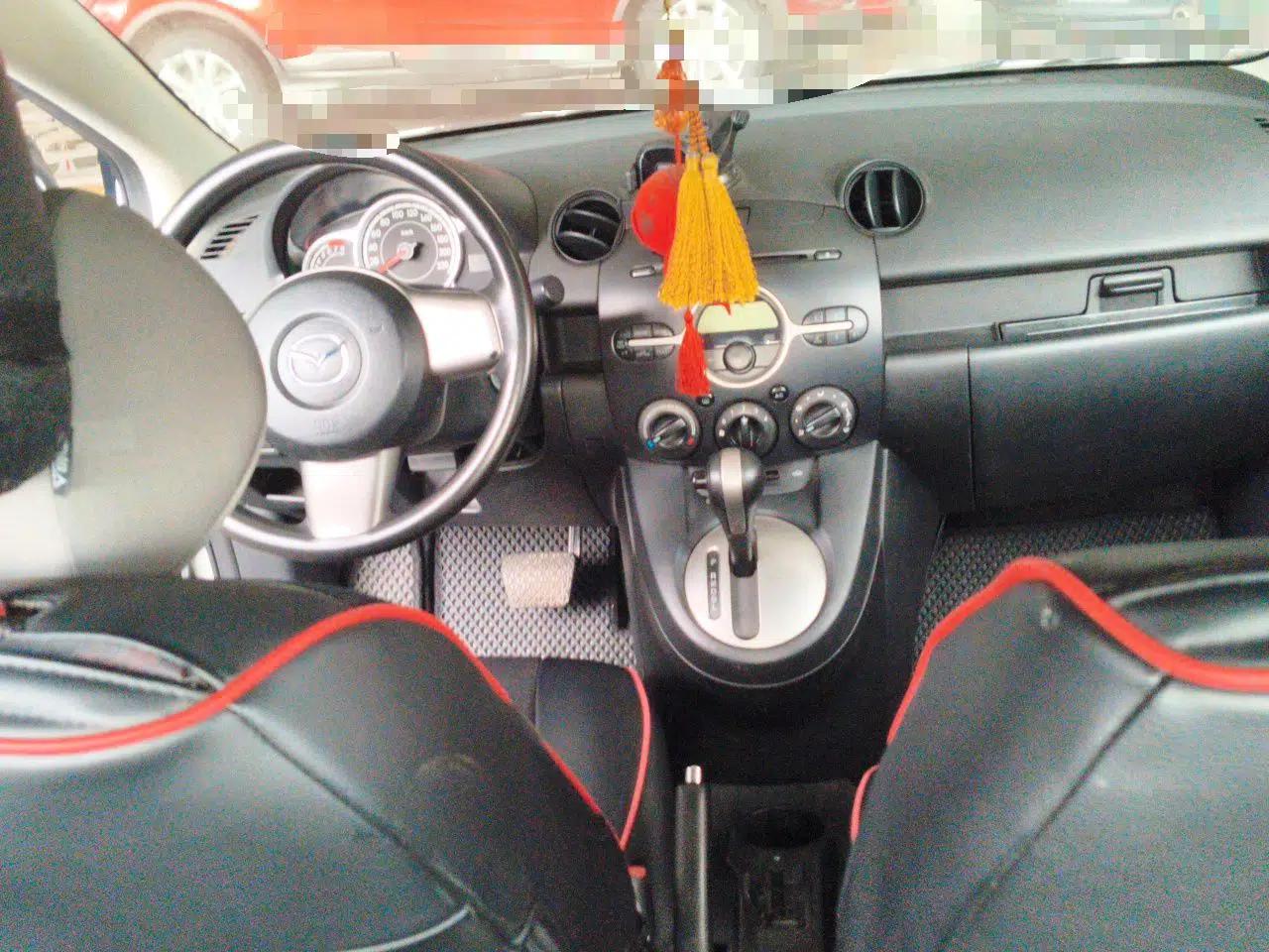 Mazda 2 2012 Sedan XuanDong 1.5L Automatic Fashion Edition — миниатюра 9