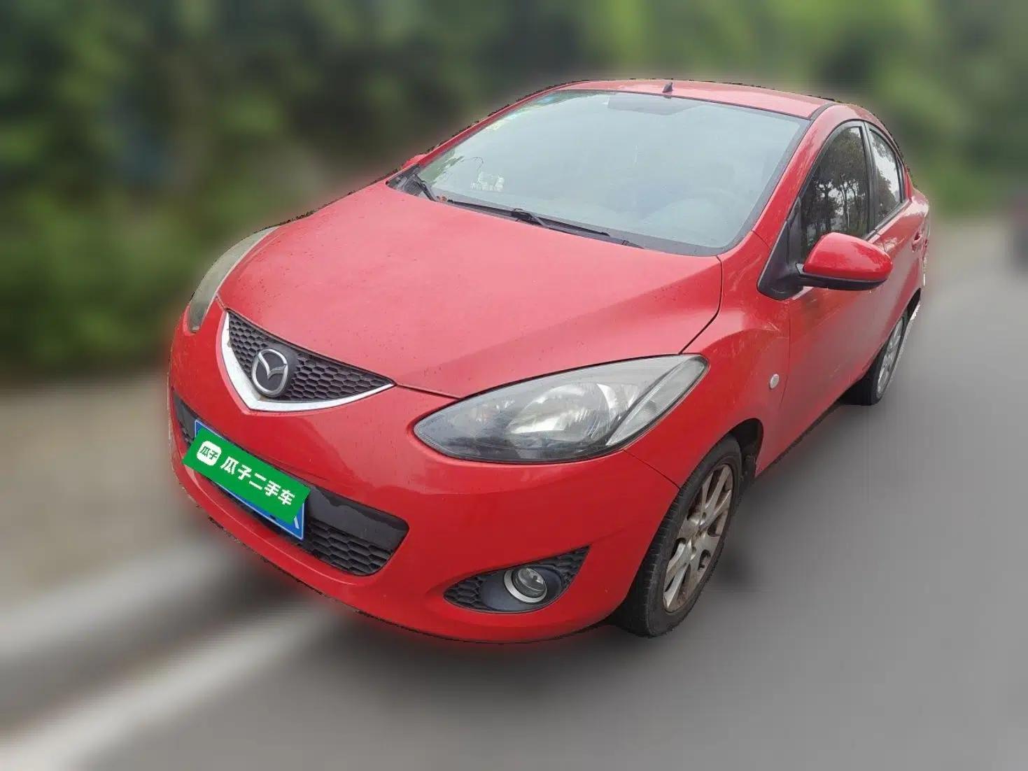 Mazda 2 2011 XuanDong 1.5L Manual Fashion Edition — миниатюра 1
