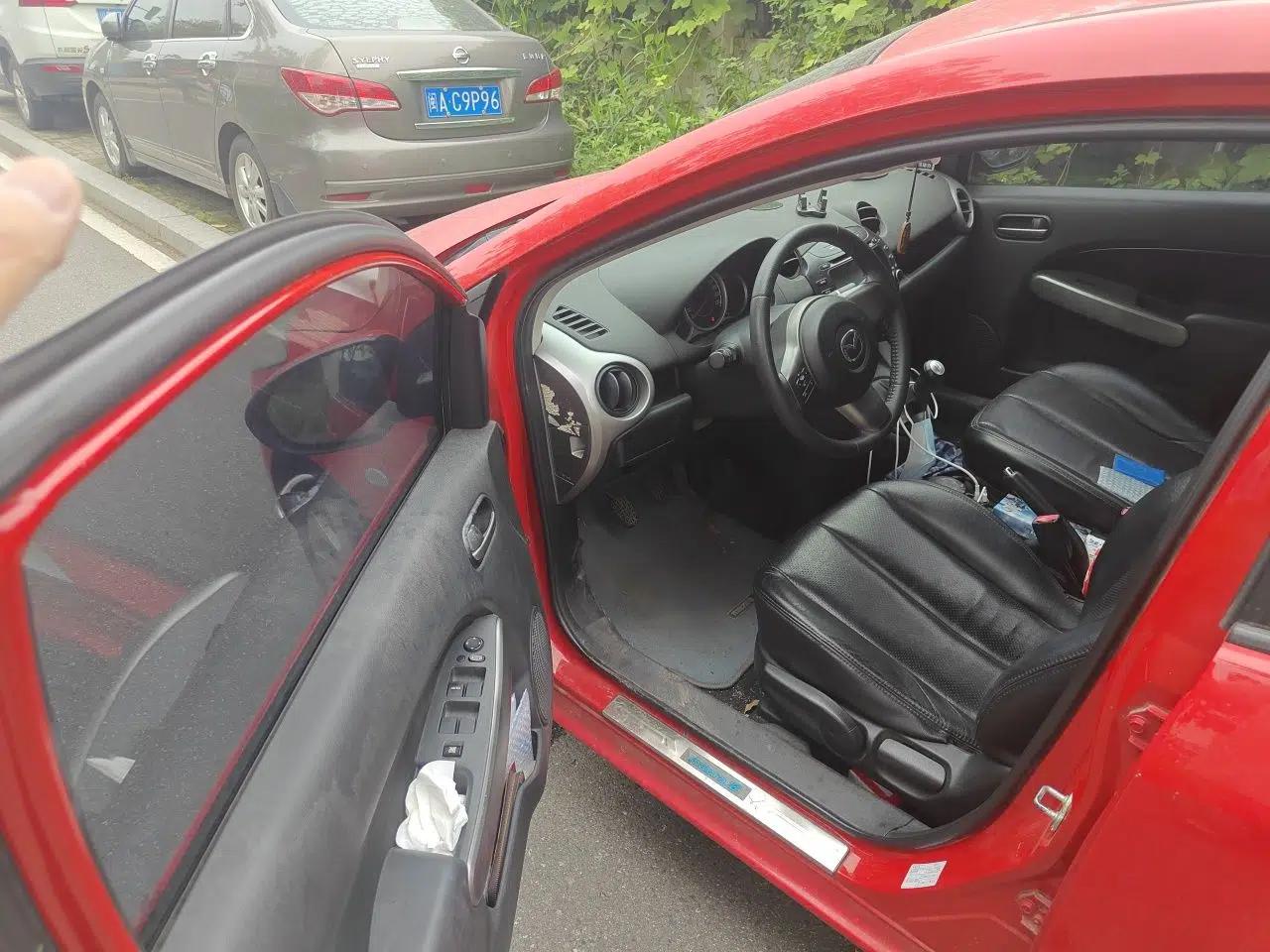 Mazda 2 2011 XuanDong 1.5L Manual Fashion Edition — миниатюра 16