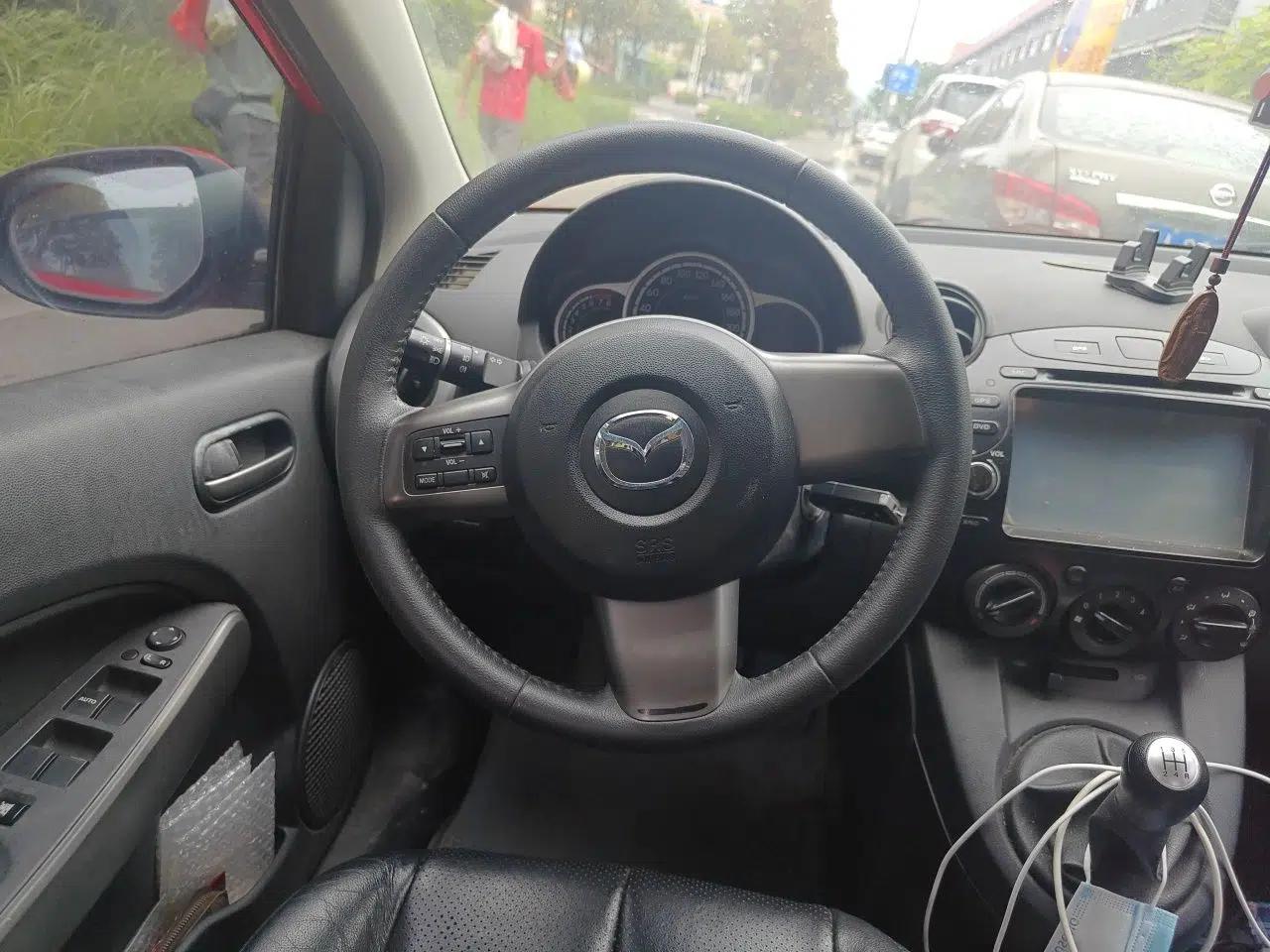 Mazda 2 2011 XuanDong 1.5L Manual Fashion Edition — миниатюра 10