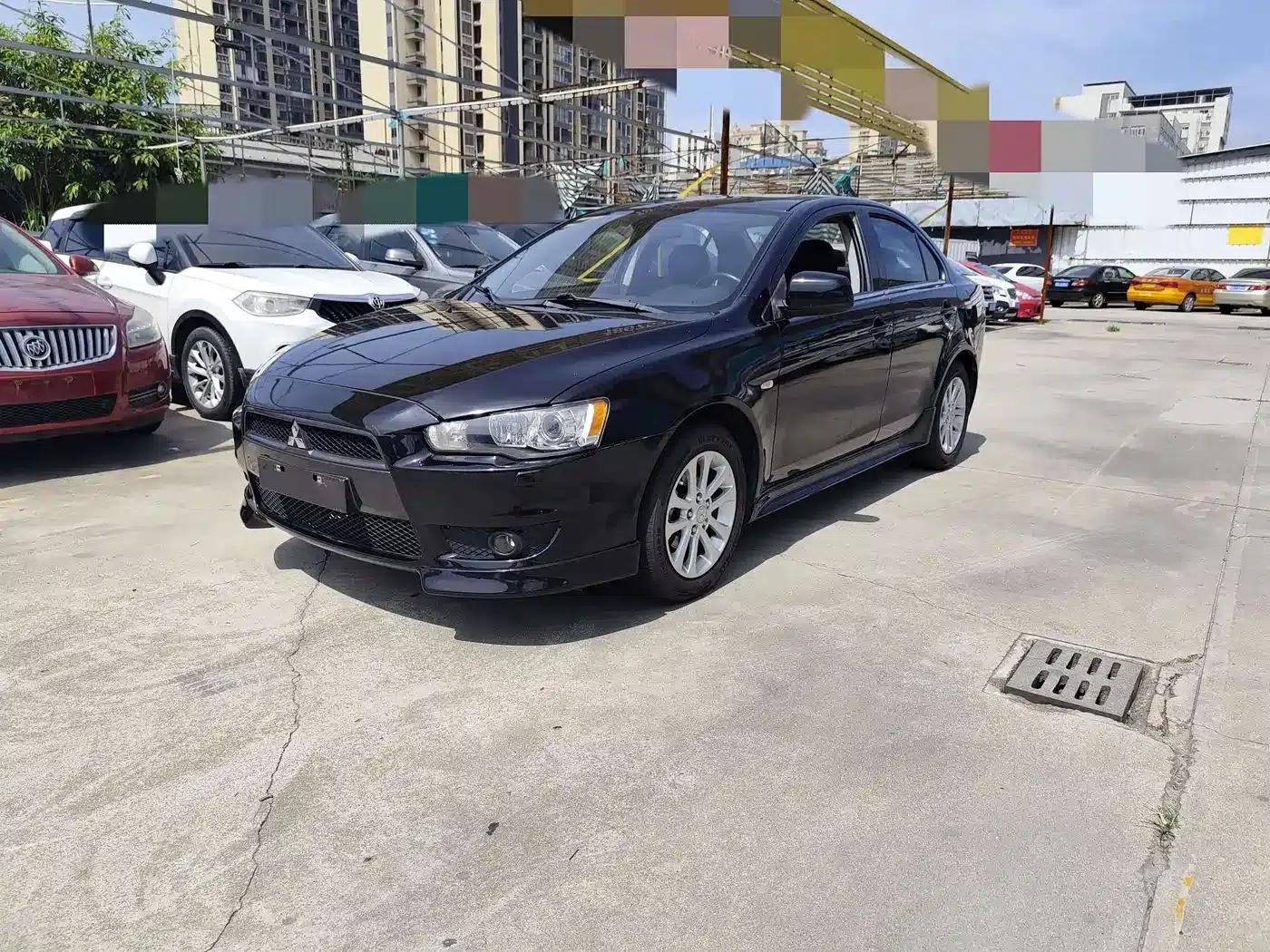 Lancer EX 2013 Yaris L 2.0L CVT Flagship Edition — миниатюра 1