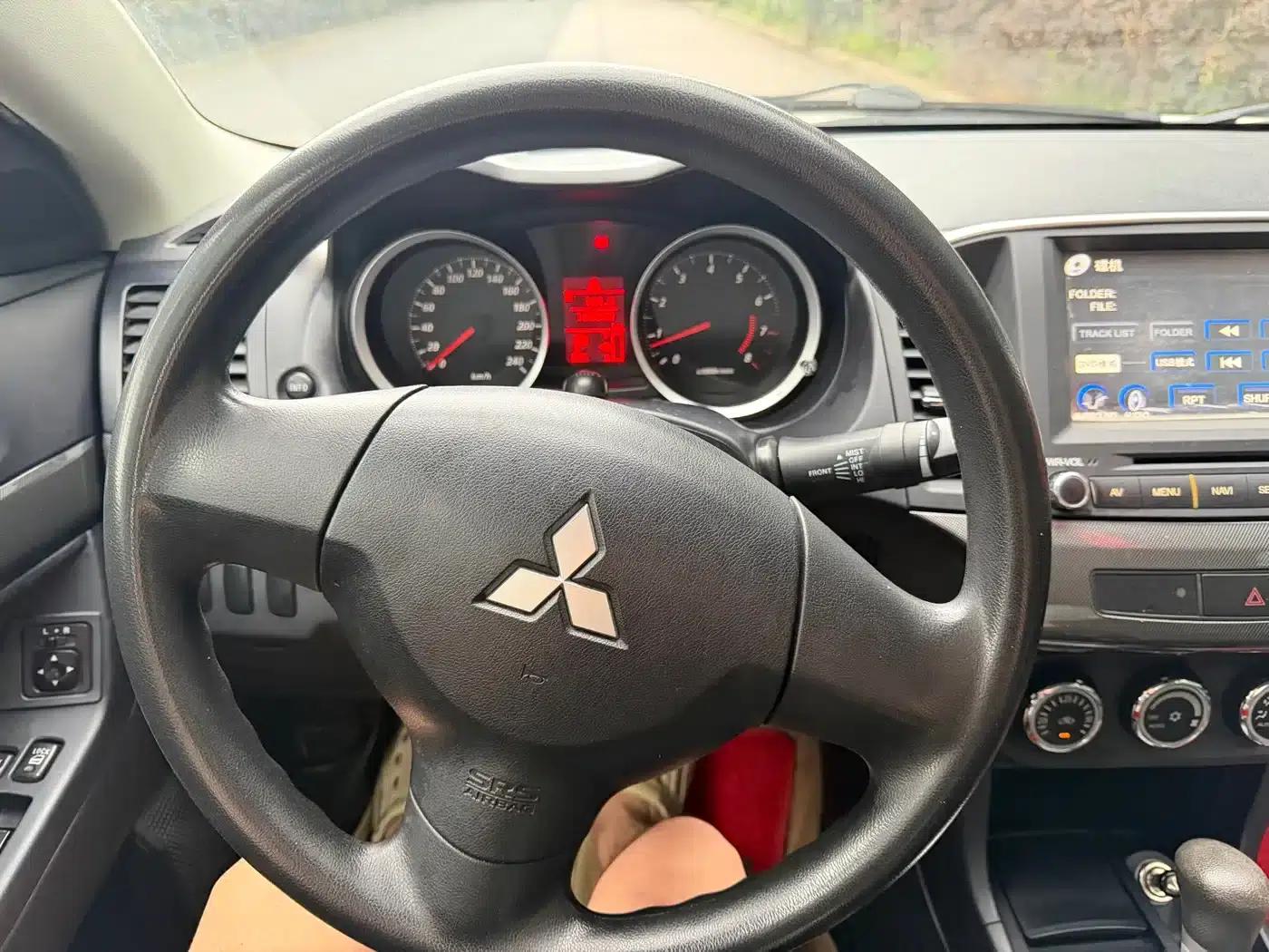 Lancer EX 2012 Lunar New Year Edition 1.8L CVT Comfort — миниатюра 16