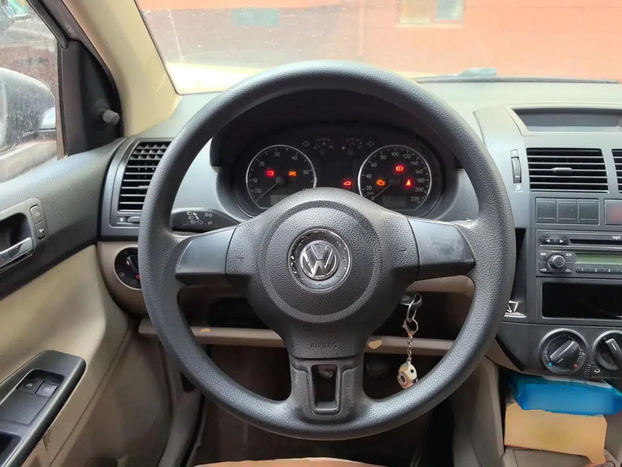 Volkswagen Polo 2011 Jingqu 1.4L Manual Sile Edition — миниатюра 10