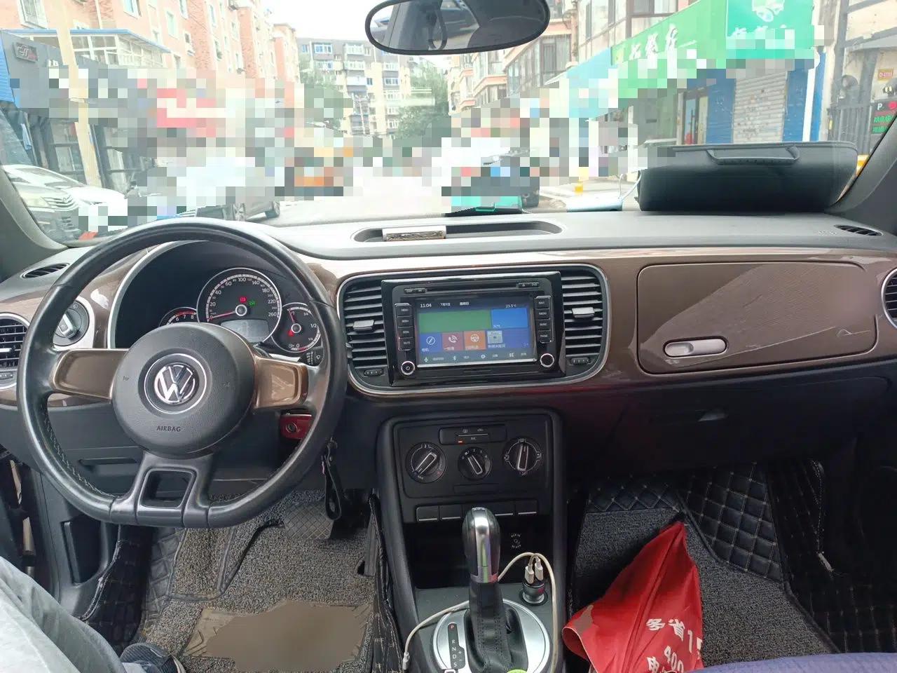 Volkswagen Beetle 2014 1.2TSI Fashion Edition — миниатюра 9