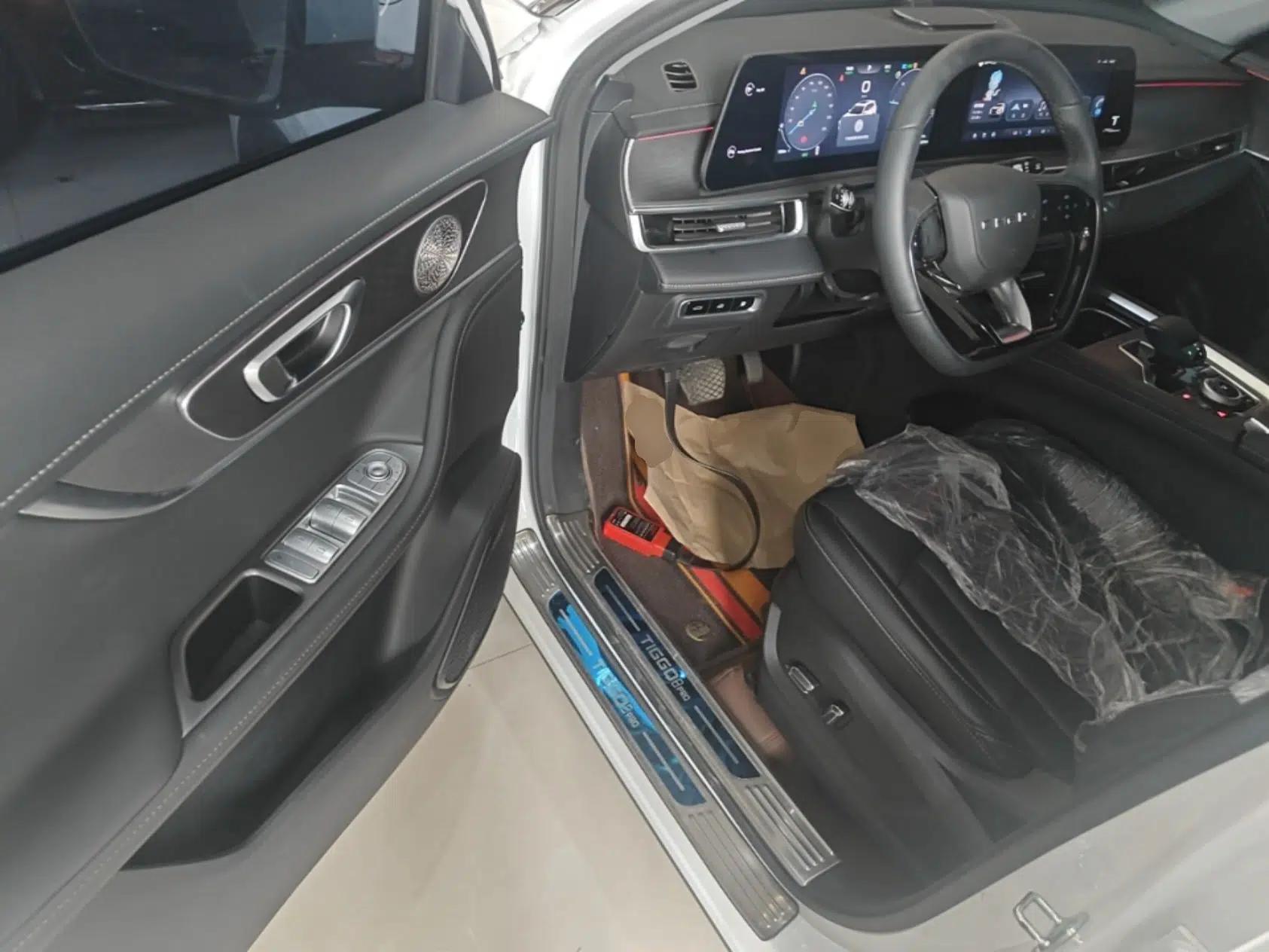 Chery Tiggo 8 PRO New Energy 2023 Champion Edition 1.5T 100km Glory Version — миниатюра 18