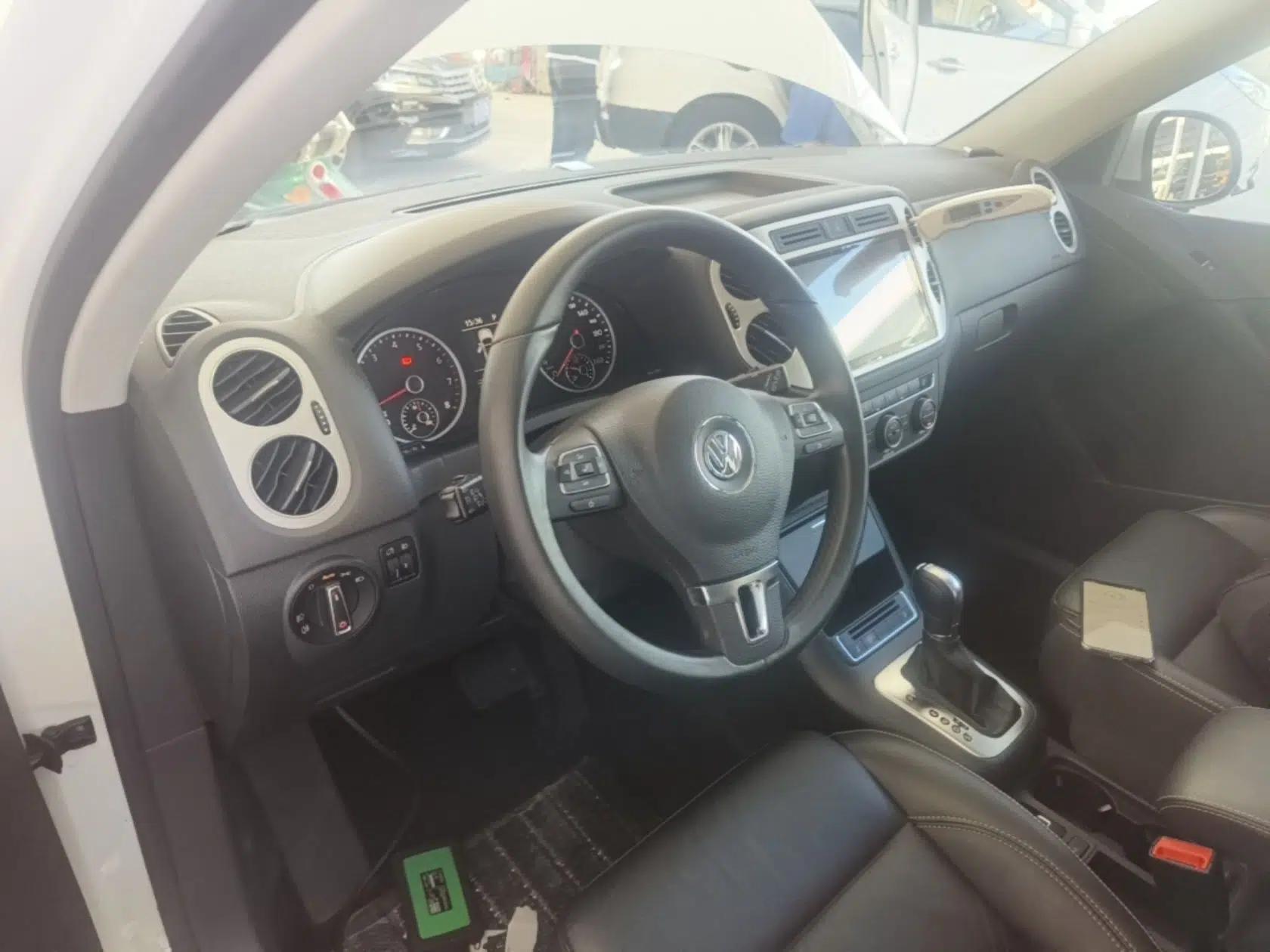 Volkswagen Tiguan 2016 280TSI Automatic Two-Wheel Drive Silk Road Comfort Edition — миниатюра 17