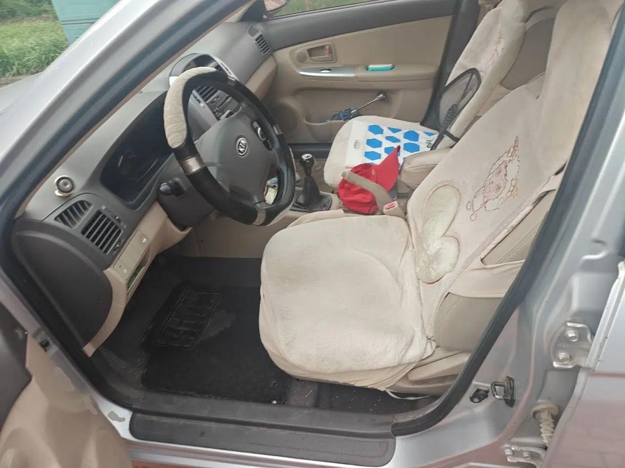 Kia Cerato 2012 1.6L MT GL — миниатюра 15