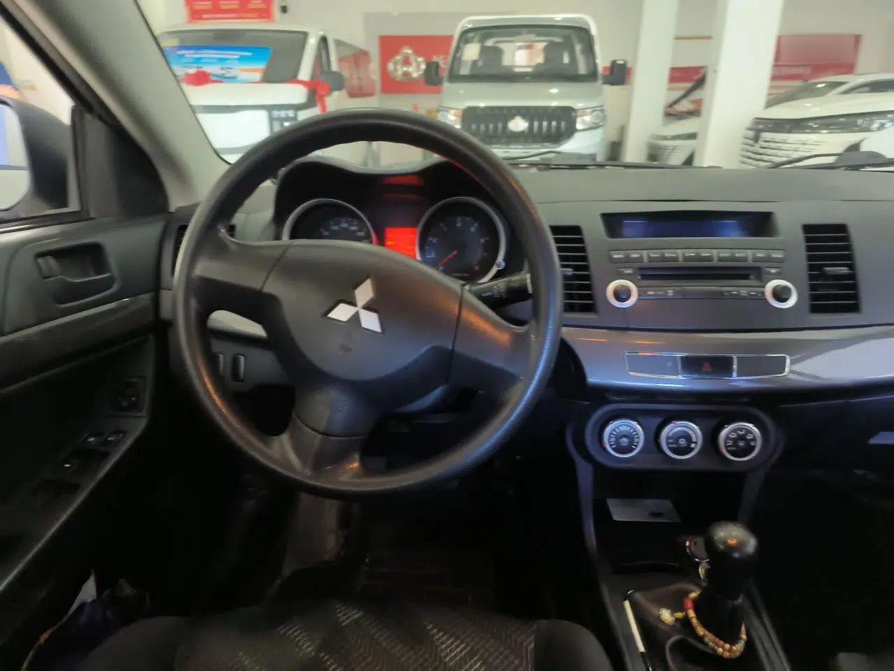 Mitsubishi Lancer EX 2013 Style Edition 1.6L Manual Classic Model — миниатюра 10