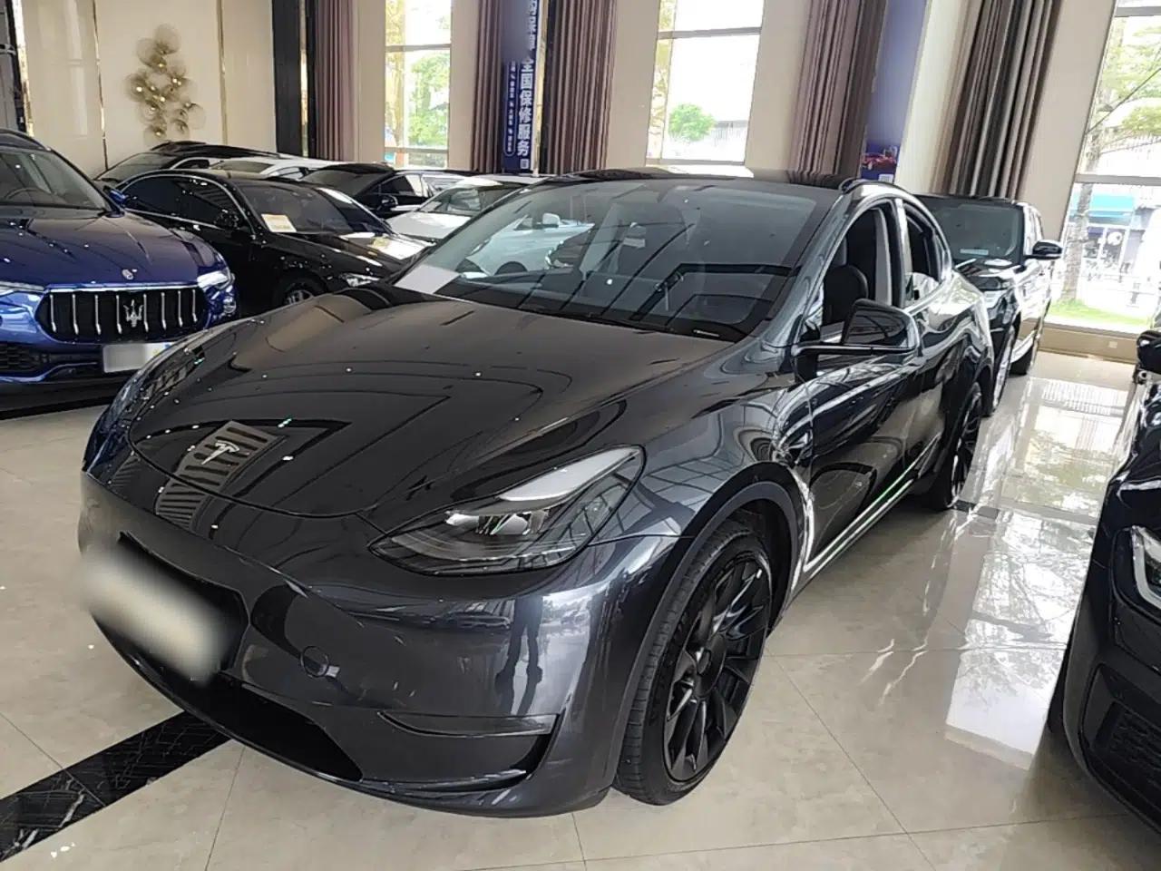 Tesla Model Y 2024 Long-Range All-Wheel-Drive Version — миниатюра 1