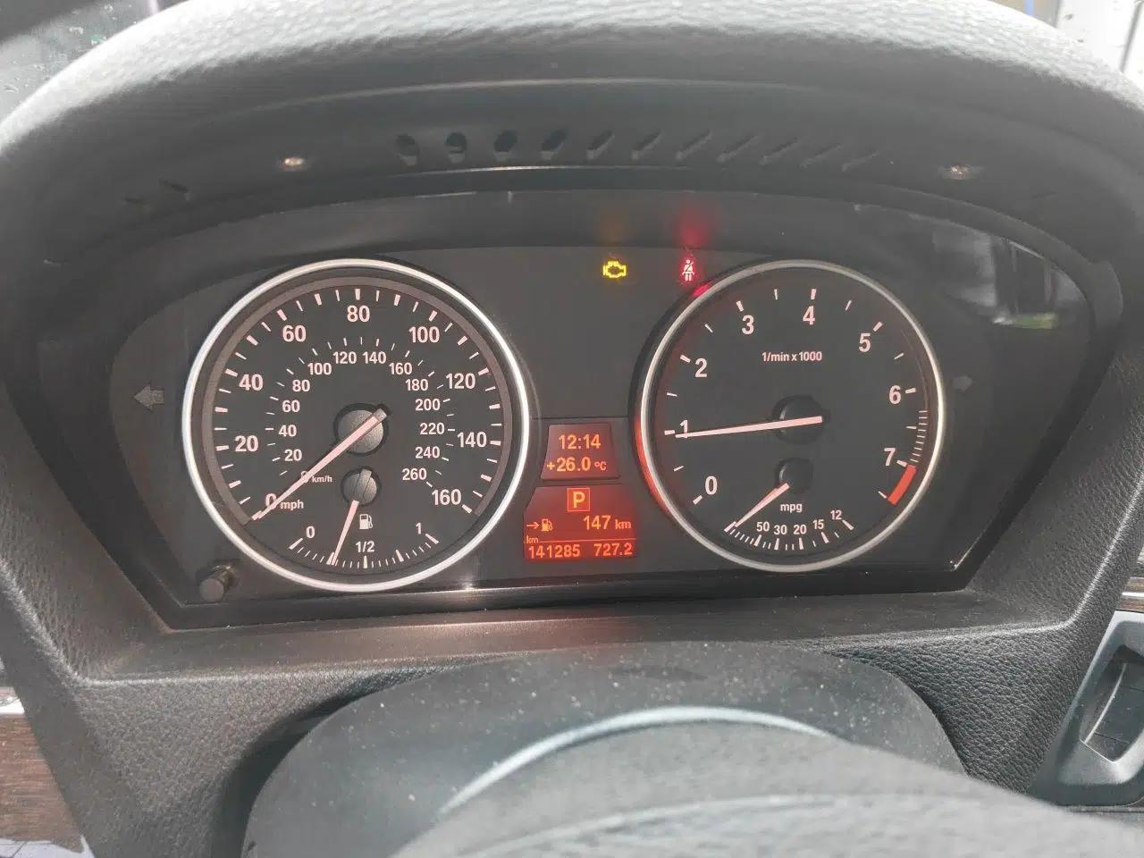 BMW X5 2011 BMW X5 (parallel import), 3.0L engine, automatic transmission, seven-seat configuration. — миниатюра 12