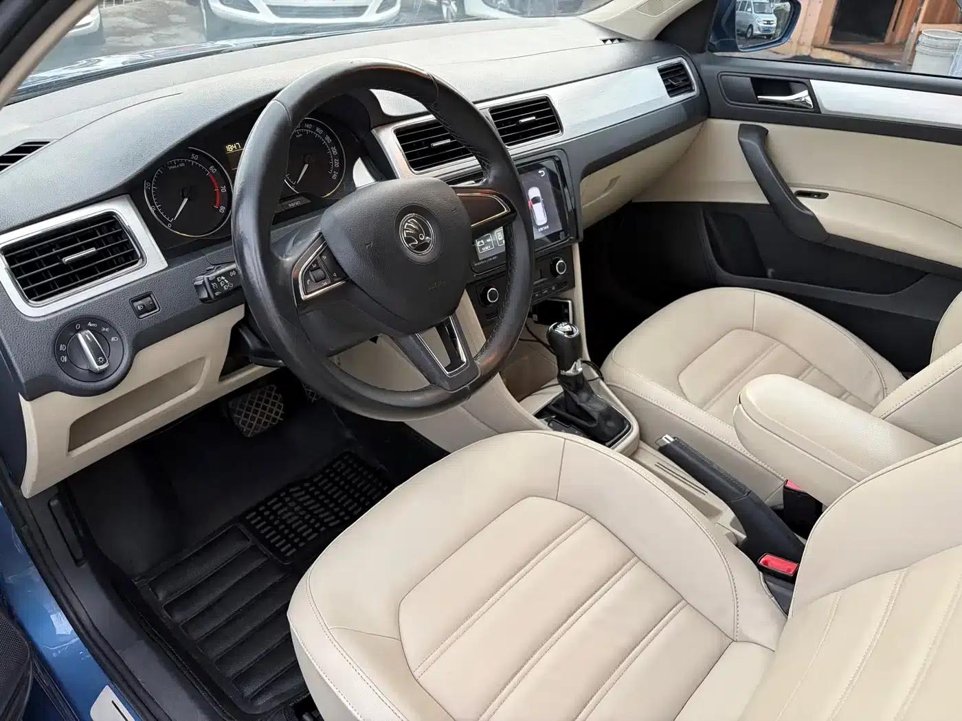 Rapid 2014 1.4TSI DSG Premium Edition — миниатюра 8