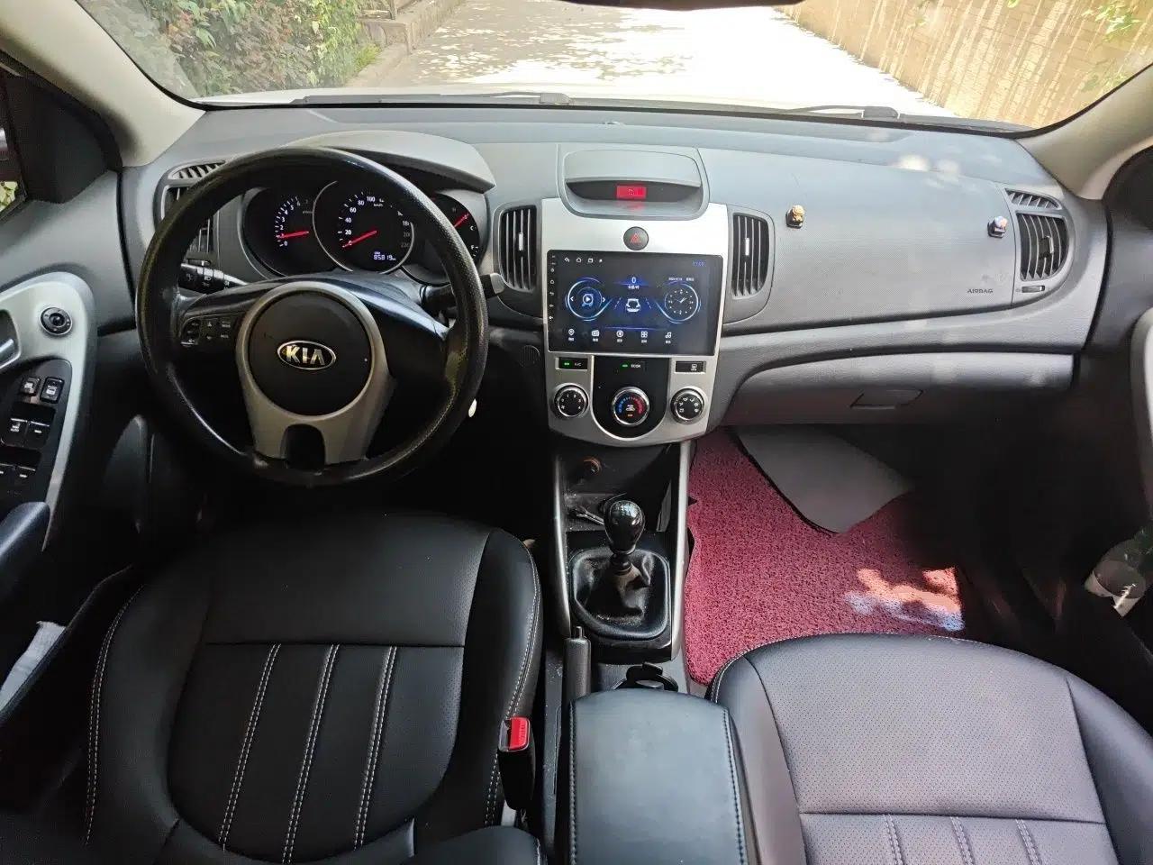 Kia Forte 2014 1.6L MT GL — миниатюра 9