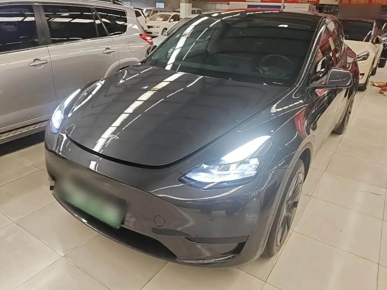 Tesla Model Y 2024 Rear-Wheel-Drive Version — миниатюра 1
