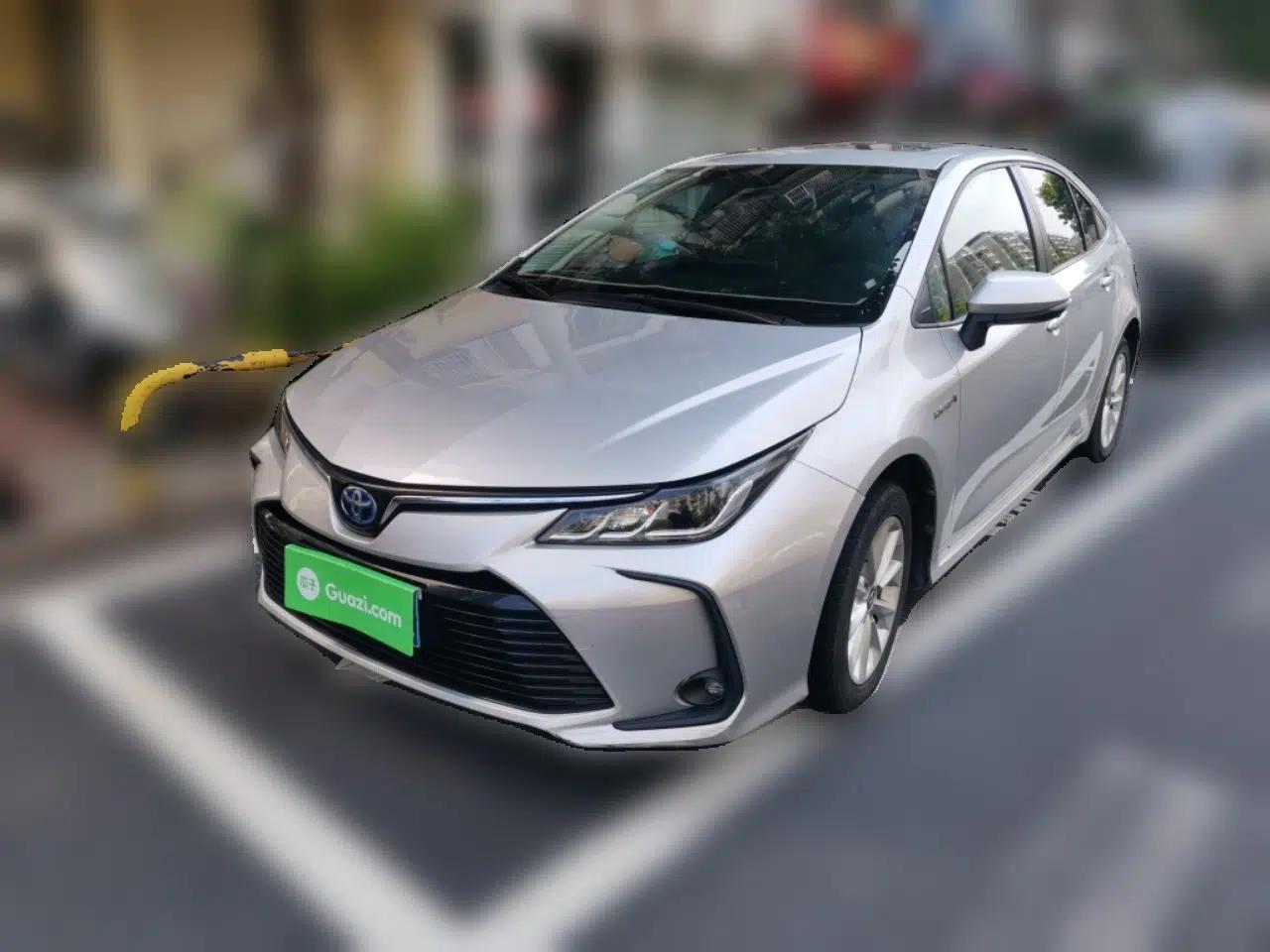 Toyota Corolla 2021 Dual-Motor 1.8L E-CVT Elite Edition — миниатюра 1