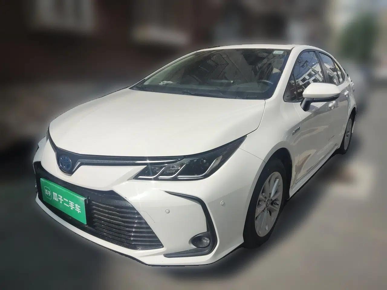 Toyota Corolla 2021 Dual-Motor 1.8L E-CVT Elite Edition — миниатюра 1