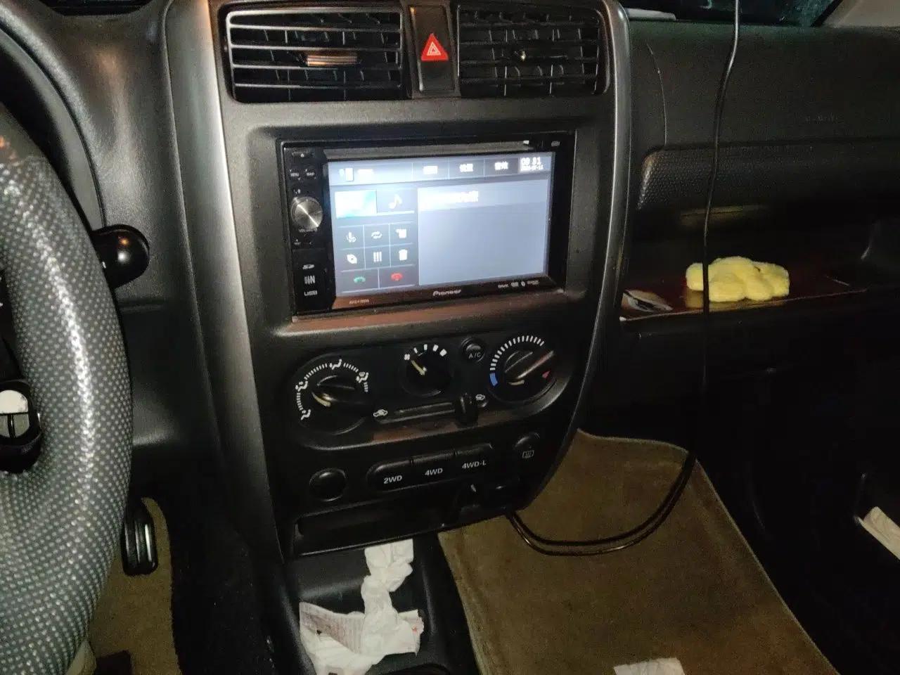 Suzuki Jimny 2012 registration, 1.3L, manual transmission, gasoline, 4 seats (imported) — миниатюра 13