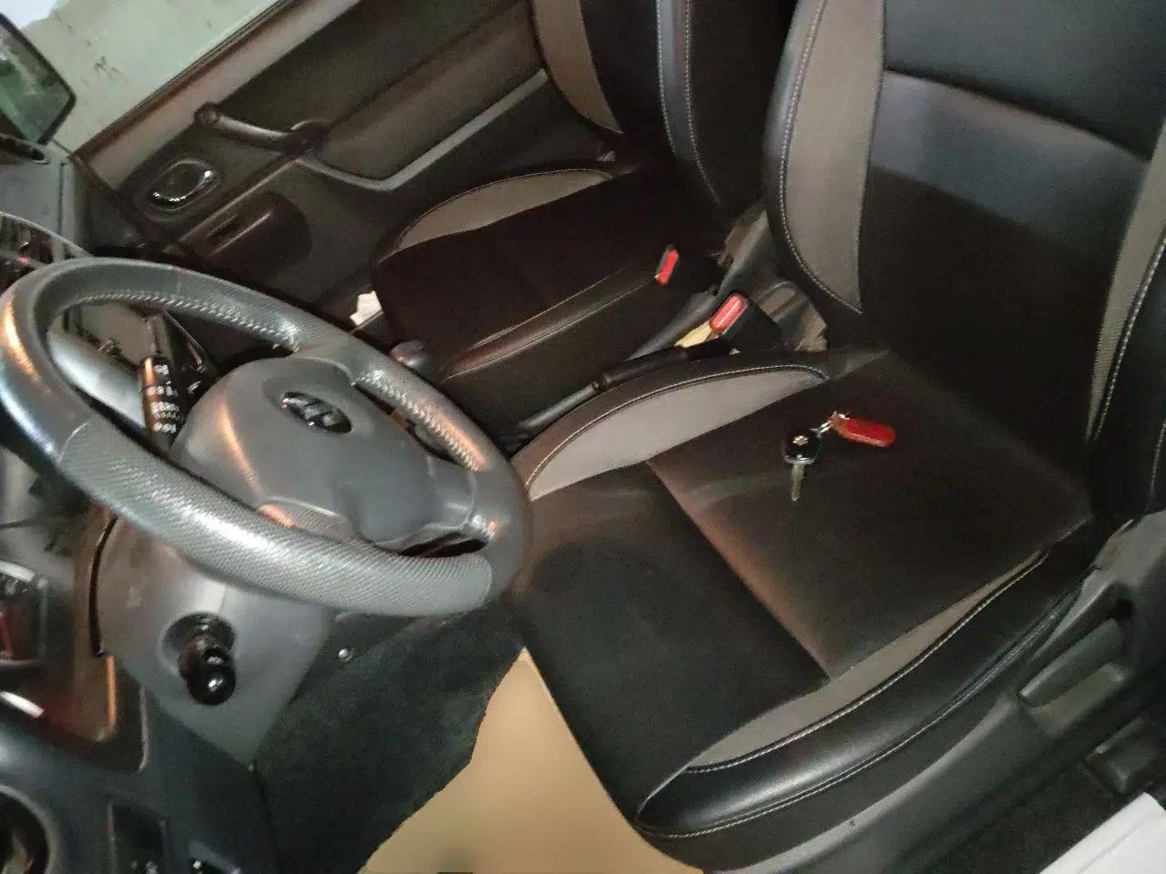Suzuki Jimny 2012 registration, 1.3L, manual transmission, gasoline, 4 seats (imported) — миниатюра 15