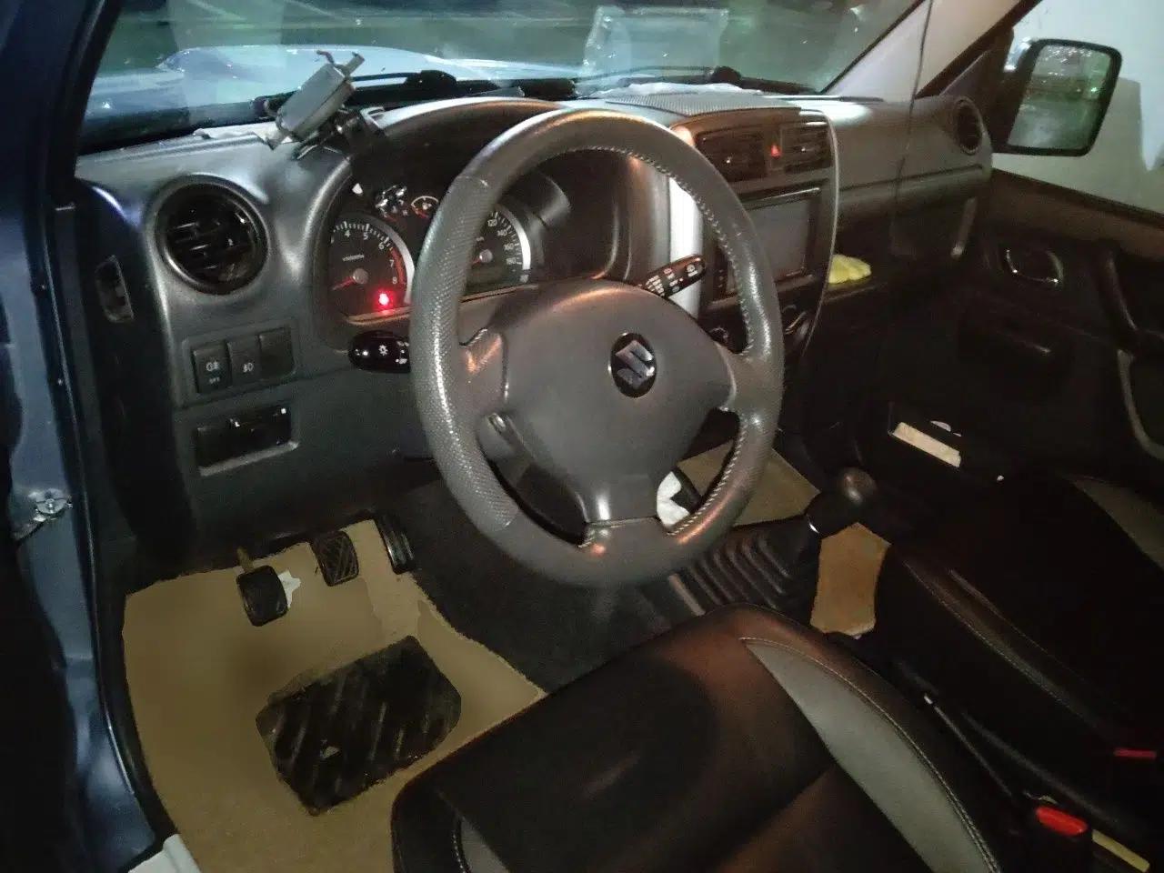 Suzuki Jimny 2012 registration, 1.3L, manual transmission, gasoline, 4 seats (imported) — миниатюра 9