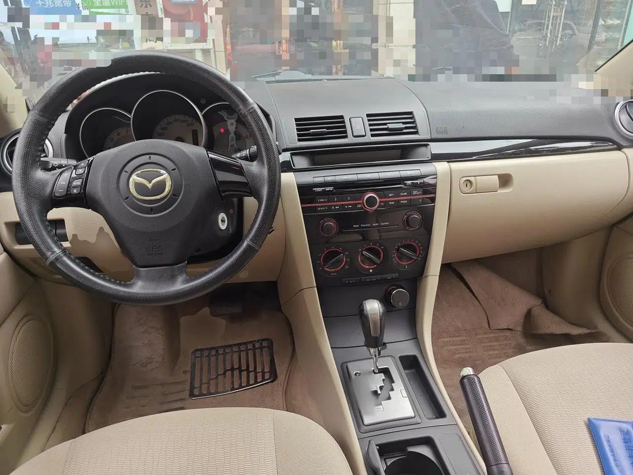 Mazda 3 2010 1.6L Automatic Classic Elite Edition — миниатюра 9