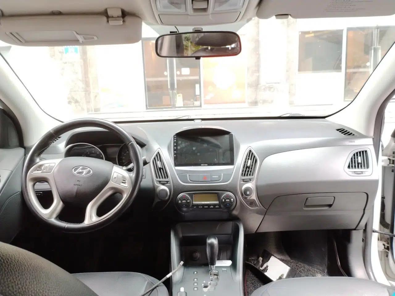 Hyundai ix35 2013 2.0L Automatic Two-Wheel Drive Smart GLS China IV Standard — миниатюра 9