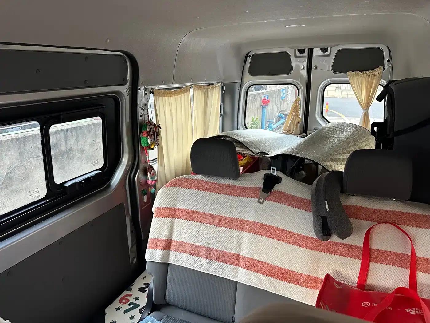 2024 Nissan Tuano, a multi-functional car with a Cummins 2.8T manual transmission, long wheelbase, mid-roof, single rear tire, and 5/6/7/9 seats. — миниатюра 6
