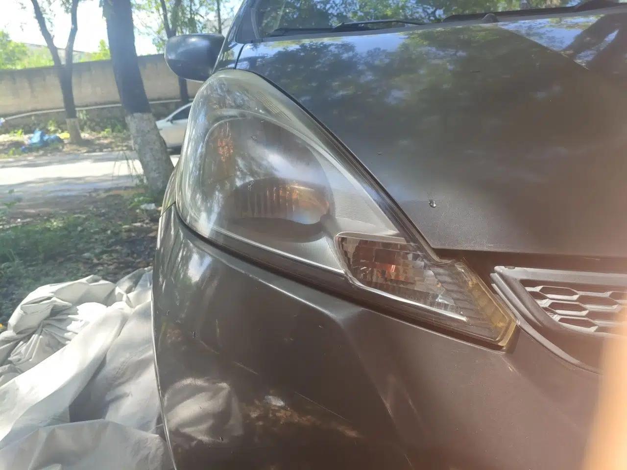 Honda Fit 2011 1.3L automatic comfort version — миниатюра 7