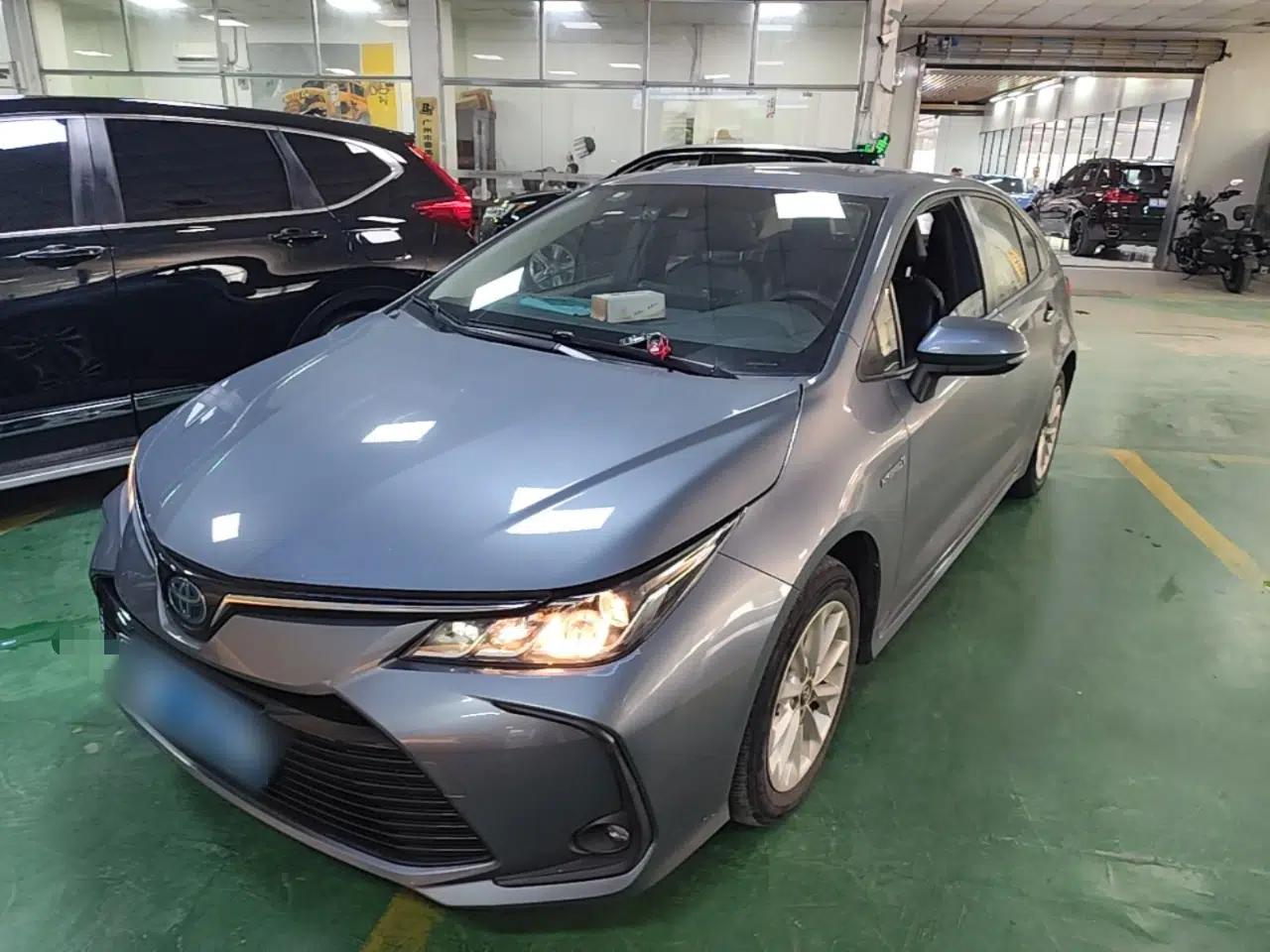 Toyota Corolla 2021 Dual-Motor 1.8L E-CVT Elite Edition — миниатюра 1