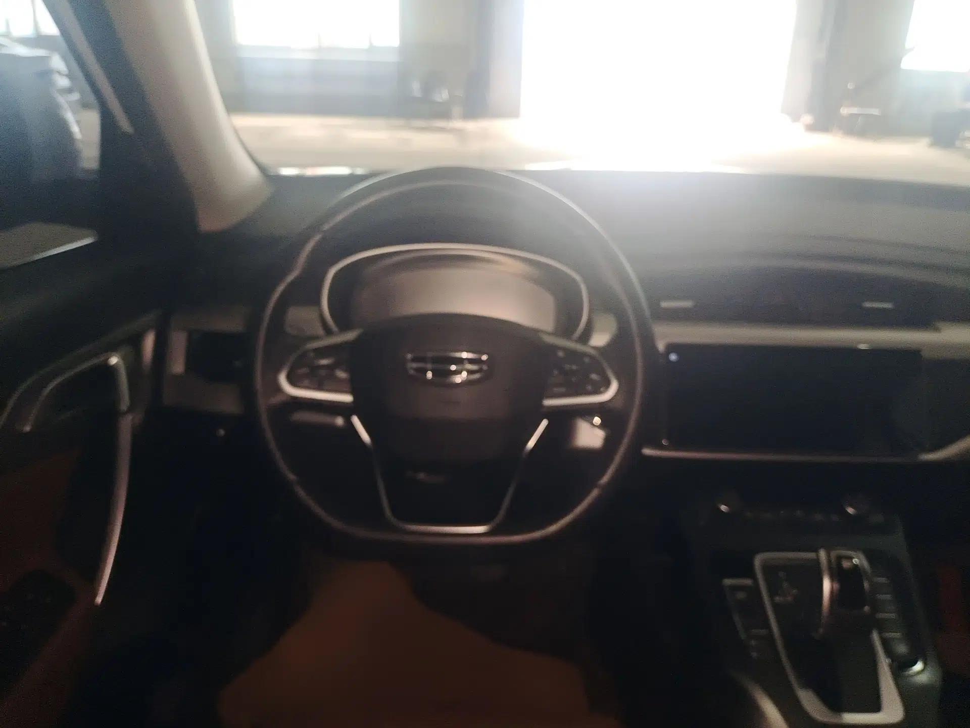 Geely Auto Emgrand X7 Sport 2021 1.8TD DCT Two-Wheel Drive Asian Games Comfort Edition — миниатюра 9