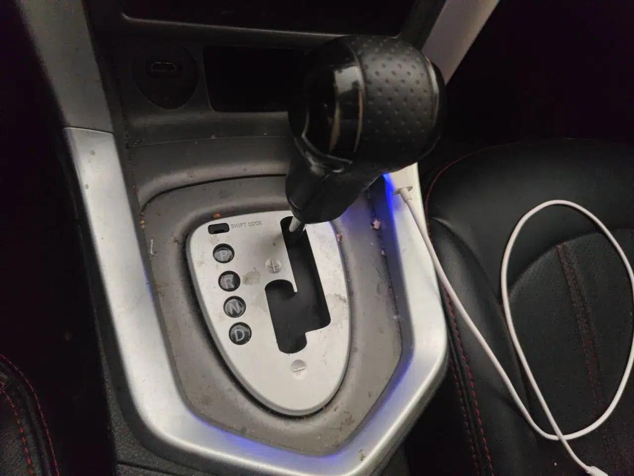 Venucia T70X 2015 2.0L CVT SmartFun Sport Edition — миниатюра 14
