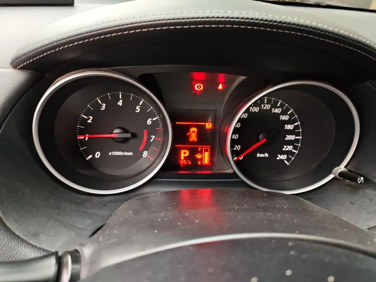 Mitsubishi Outlander 2012 Kicks 2.4 Fashion Navigation Edition — миниатюра 11