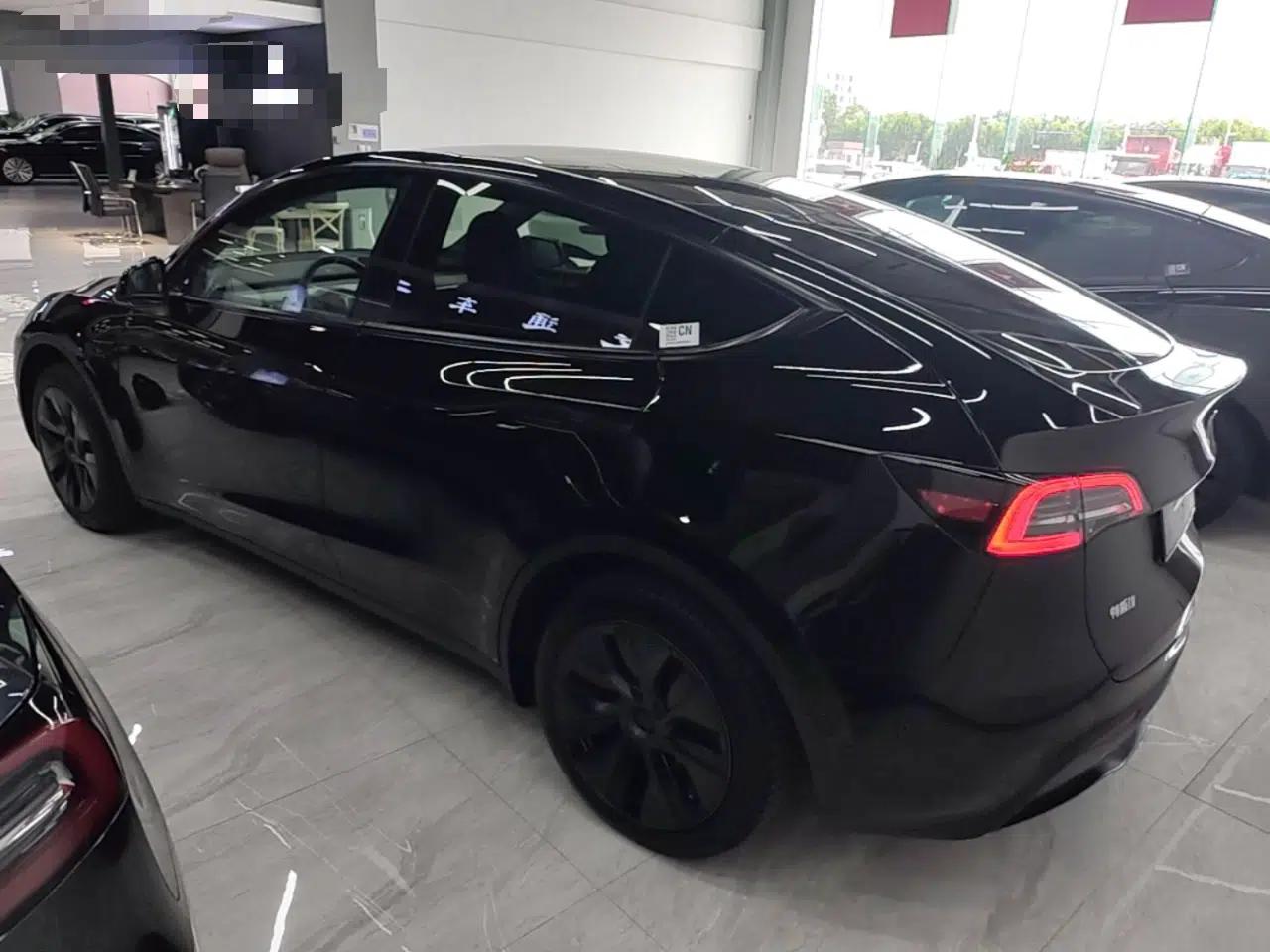 Tesla Model Y 2023 Rear-Wheel-Drive Version — миниатюра 4