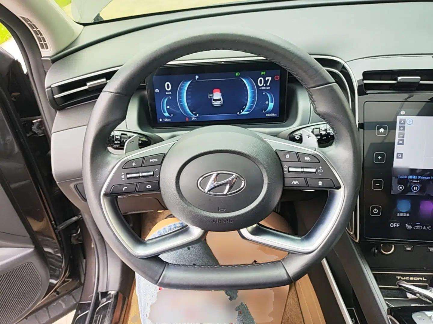 Hyundai Tucson 2021 Tucson L 1.5T Four-Wheel Drive LUX Premium Edition — миниатюра 13