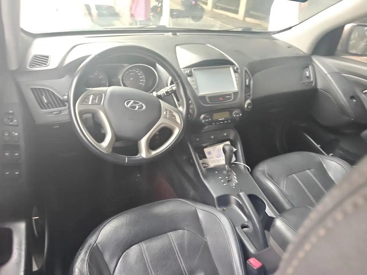 Hyundai ix35 2013 2.0L Automatic Two-Wheel Drive Smart GLS China IV Standard — миниатюра 9