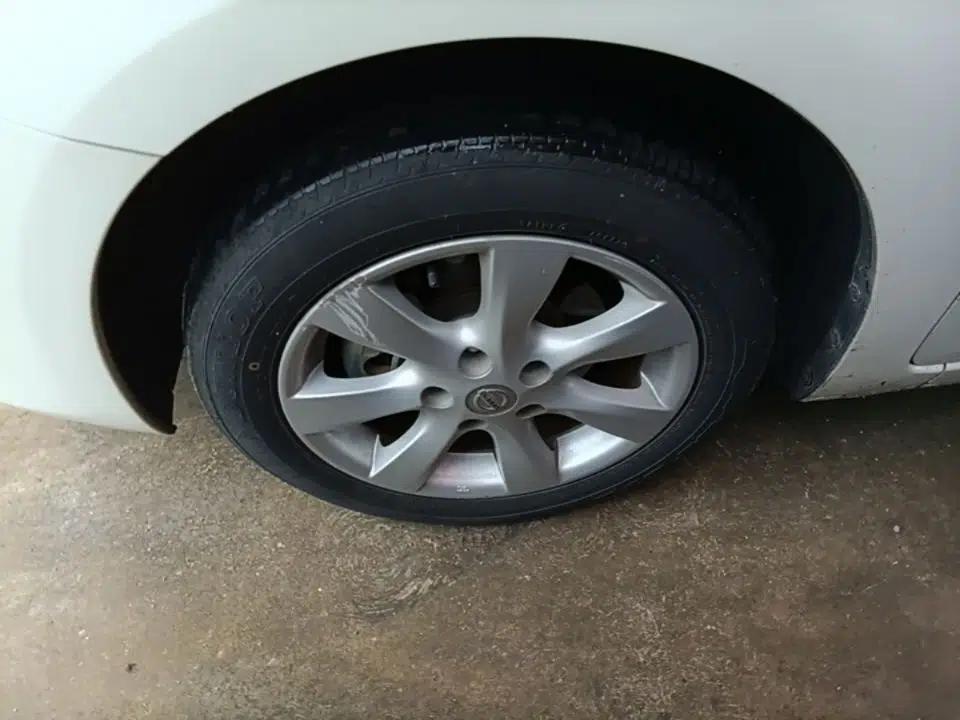 Nissan Tiida 2014 1.6L CVT Cool Cafe Edition — миниатюра 10