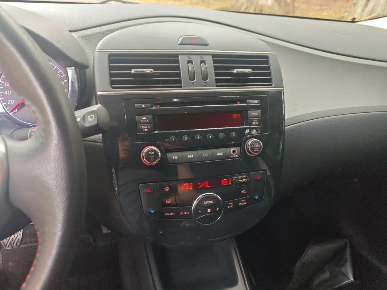 Nissan Tiida 2011 1.6T Manual Xuan Dong Edition — миниатюра 13