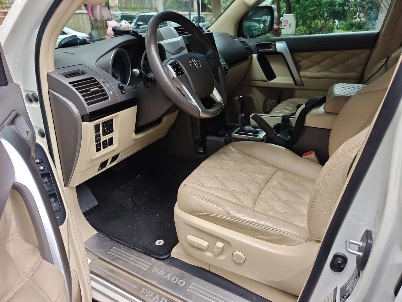 Toyota Prado 2015, 2.7L gasoline, 7-seater parallel import (9 airbags with refrigerator) — миниатюра 16