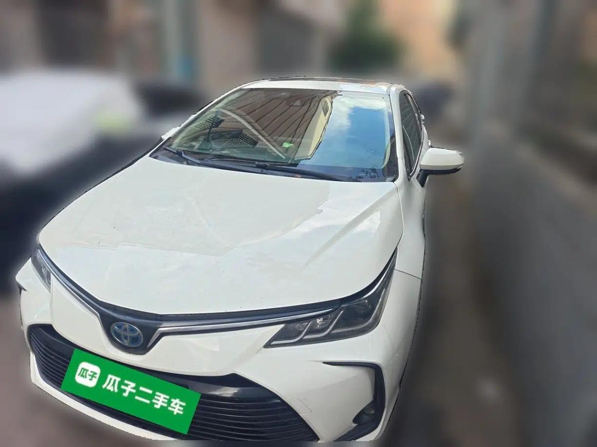 Toyota Corolla 2021 Dual-Motor 1.8L E-CVT Elite Edition — миниатюра 1
