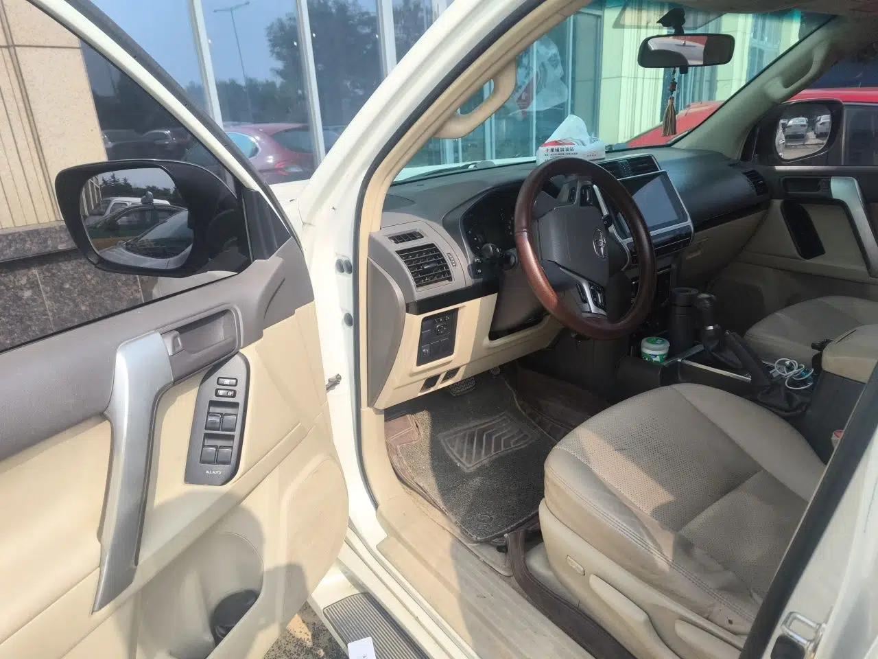 Toyota Prado 2014 model, automatic, 2.7L, 7 seats, gasoline — миниатюра 16